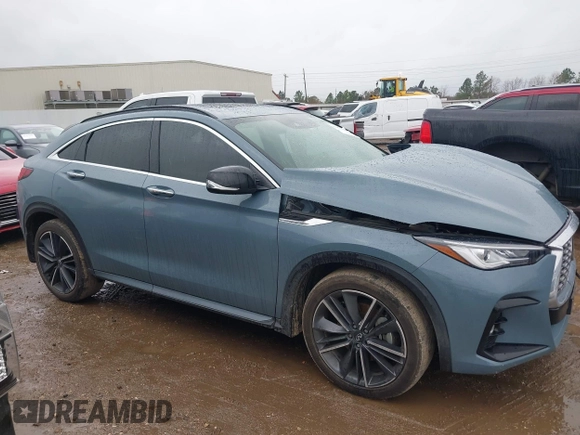 2023 Infiniti QX55 Luxe z VIN 3PCAJ5JRXPF109797, wystawiony jako IAAI lot #41455665 z przebiegiem 31 561 mil mil oraz . Historia ofert i sprzedaży dostępna na DreamBid. Obrazek 13.