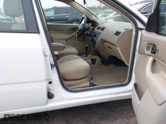 2007 Ford Focus S with VIN 1FAFP34N07W289097, listed as a IAAI auction lot 41984450 with 94,601 mi miles and . Bid and sale history available at DreamBid. Image 5.