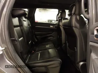 2017 Jeep Grand Cherokee Overland z VIN 1C4RJFCG6HC641812, wystawiony jako IAAI lot #42053404 z przebiegiem 129 184 mil mil oraz . Historia ofert i sprzedaży dostępna na DreamBid. Obrazek 8.