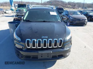 2016 Jeep Cherokee Latitude with VIN 1C4PJLCB8GW330017, listed as a IAAI auction lot 41444346 with 354,212 mi miles. Bid and sale history available at carsss.com. Image 12.