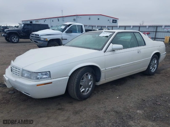 1998 Cadillac Eldorado with VIN 1G6EL12Y2WU603722, listed as a IAAI auction lot 41879733 with 81,780 mi miles. Bid and sale history available at carsss.com. Image 2.