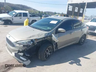 2015 Ford Focus SE with VIN 1FADP3F24FL260387, listed as a IAAI auction lot 41990194 with 80,673 mi miles. Bid and sale history available at carsss.com. Image 2.