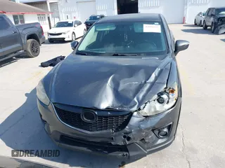 2015 Mazda CX-5 Touring with VIN JM3KE2CY9F0468199, listed as a IAAI auction lot 42099253 with 110,909 mi miles and . Bid and sale history available at carsss.com. Image 12.