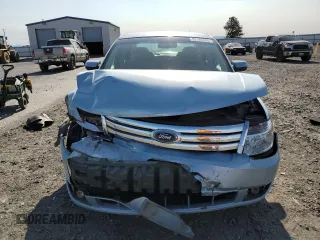 2008 Ford Taurus SEL z VIN 1FAHP24W38G148905, wystawiony jako Copart lot #59186355 z przebiegiem 108 185 mil mil oraz Szkoda całkowita • Salvage title. Historia ofert i sprzedaży dostępna na DreamBid. Obrazek 5.