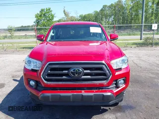 2022 Toyota Tacoma SR with VIN 3TMCZ5AN7NM470900, listed as a IAAI auction lot 42060911 with 38,869 mi miles and . Bid and sale history available at DreamBid. Image 12.