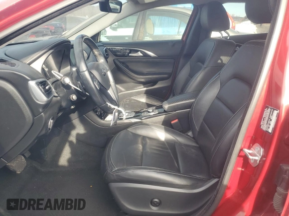 2018 Infiniti QX30 Premium with VIN SJKCH5CR7JA061030, listed as a Copart auction lot 86605824 with 94,717 mi miles and Clean title. Bid and sale history available at DreamBid. Image 7.