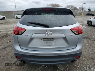 2016 Mazda CX-5 Grand Touring with VIN JM3KE2DY2G0894056, listed as a Copart auction lot 49247815 with 56,039 mi miles and Salvage Title. Bid and sale history available at carsss.com. Image 6.