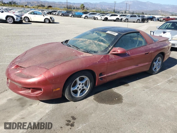 1998 Pontiac Firebird Firebird z VIN 2G2FS22K6W2202173, wystawiony jako Copart lot #77708594 z przebiegiem Nie podano mil oraz Czysty tytuł • Clean title. Historia ofert i sprzedaży dostępna na DreamBid. Obrazek 1.