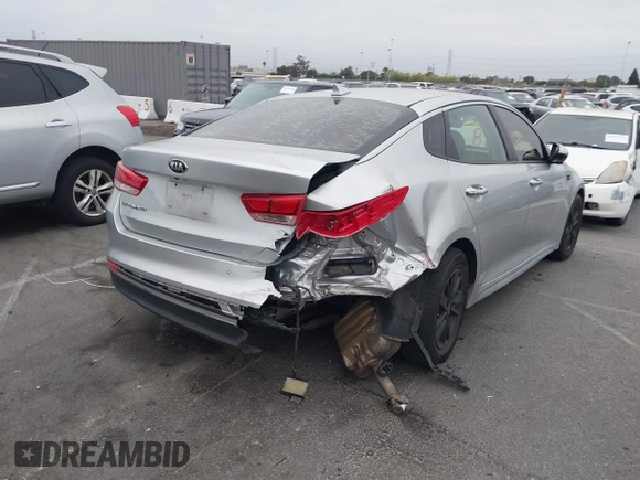 2018 Kia Optima S with VIN 5XXGT4L35JG216039, listed as a IAAI auction lot 42451216 with 91,679 mi miles and . Bid and sale history available at DreamBid. Image 4.