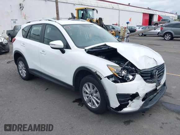 2016 Mazda CX-5 Sport with VIN JM3KE4BY7G0764563, listed as a IAAI auction lot 42279993 with 128,950 mi miles and . Bid and sale history available at DreamBid. Image 1.