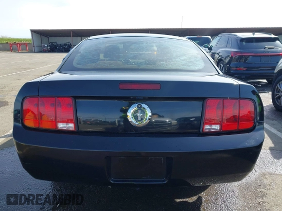 2008 Ford Mustang Deluxe with VIN 1ZVHT80N085138945, listed as a IAAI auction lot 41820988 with 127,880 mi miles. Bid and sale history available at carsss.com. Image 16.