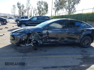 2024 Tesla Model 3 with VIN 5YJ3E1EA0RF718703, listed as a IAAI auction lot 41278243 with 6,504 mi miles. Bid and sale history available at carsss.com. Image 6.