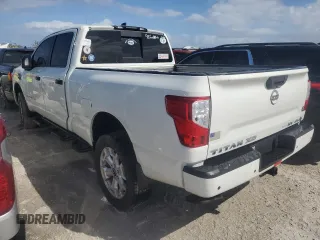 2024 Nissan Titan XD PRO-4X with VIN 1N6AA1FB4RN105718, listed as a Copart auction lot 74979434 with 14,813 mi miles and Non Repairable. Bid and sale history available at carsss.com. Image 2.
