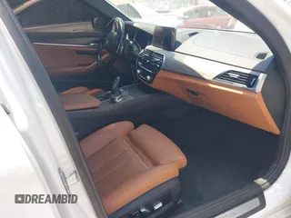 2018 BMW 5 Series 530e with VIN WBAJA9C58JB252868, listed as a IAAI auction lot 42323949 with 100,530 mi miles and . Bid and sale history available at DreamBid. Image 5.