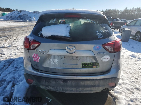 2014 Mazda CX-5 Sport with VIN JM3KE4BE2E0360024, listed as a Copart auction lot 47014035 with Not provided miles and Salvage title. Bid and sale history available at DreamBid. Image 6.