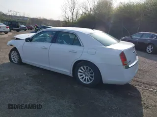 2012 Chrysler 300 with VIN 2C3CCAAG6CH116930, listed as a IAAI auction lot 41940820 with 208,279 mi miles. Bid and sale history available at carsss.com. Image 3.