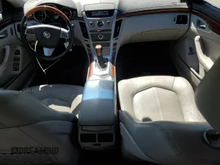 2012 Cadillac CTS Luxury with VIN 1G6DE5E55C0118007, listed as a Copart auction lot 56321185 with 146,653 mi miles and Salvage Title. Bid and sale history available at DreamBid. Image 8.