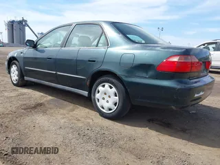 1999 Honda Accord LX with VIN 1HGCG6654XA145126, listed as a IAAI auction lot 42090873 with 76,421 mi miles and . Bid and sale history available at DreamBid. Image 3.