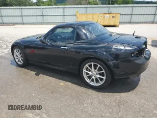 2009 Mazda MX-5 Miata Grand Touring with VIN JM1NC26F390204924, listed as a Copart auction lot 63492955 with 215,707 mi miles and Salvage title. Bid and sale history available at DreamBid. Image 2.