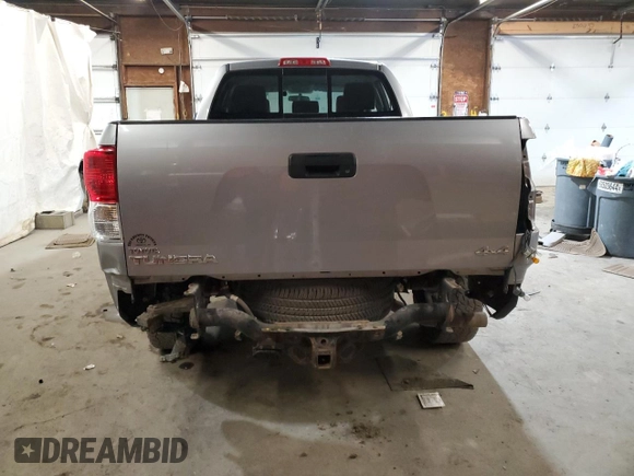 2013 Toyota Tundra z VIN 5TFUY5F13DX299066, wystawiony jako Copart lot #53352745 z przebiegiem 120 869 mil mil oraz Szkoda całkowita • Salvage title. Historia ofert i sprzedaży dostępna na DreamBid. Obrazek 6.