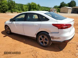 2018 Ford Focus SE with VIN 1FADP3FE9JL264664, listed as a Copart auction lot 61726905 with 28,471 mi miles and Salvage title. Bid and sale history available at DreamBid. Image 2.