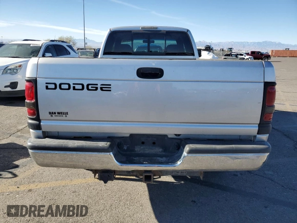 2001 Dodge 2500 z VIN 1B7KC23641J616324, wystawiony jako Copart lot #84152154 z przebiegiem 163 213 mil mil oraz Szkoda całkowita • Salvage title. Historia ofert i sprzedaży dostępna na DreamBid. Obrazek 6.