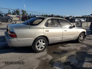 1995 Lexus ES 300 with VIN JT8GK13T6S0101694, listed as a Copart auction lot 77683754 with 247,984 mi miles and Salvage Title. Bid and sale history available at DreamBid. Image 3.