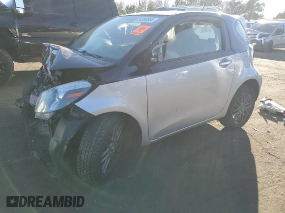 2014 Scion iQ z VIN JTNJJXB04EJ028369, wystawiony jako Copart lot #84030864 z przebiegiem Nie podano mil oraz Szkoda całkowita • Salvage title. Historia ofert i sprzedaży dostępna na DreamBid. Obrazek 1.