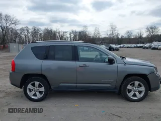 2011 Jeep Compass with VIN 1J4NF1FB1BD251618, listed as a IAAI auction lot 41633368 with 125,326 mi miles. Bid and sale history available at carsss.com. Image 13.