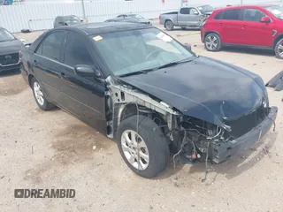 2005 Toyota Camry LE with VIN 4T1BF32K15U091945, listed as a IAAI auction lot 42124503 with 212,951 mi miles and . Bid and sale history available at DreamBid. Image 1.