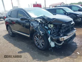 2021 Honda CR-V Touring with VIN 5J6RW2H94ML016530, listed as a IAAI auction lot 42488535 with 37,919 mi miles and . Bid and sale history available at DreamBid. Image 1.