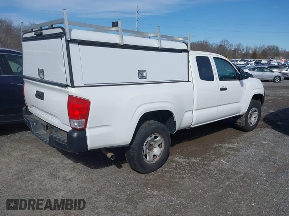 2021 Toyota Tacoma SR with VIN 3TYRX5GN6MT007673, listed as a IAAI auction lot 41691995 with 97,735 mi miles and . Bid and sale history available at DreamBid. Image 4.