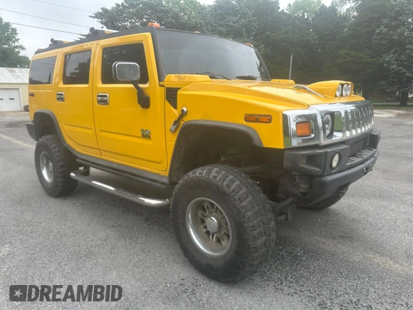 2003 Hummer H2 z VIN 5GRGN23U53H141743, wystawiony jako Copart lot #60153185 z przebiegiem 137 863 mil mil oraz Czysty tytuł • Clean title. Historia ofert i sprzedaży dostępna na DreamBid. Obrazek 1.