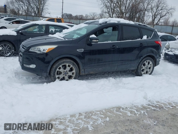 2016 Ford Escape Titanium with VIN 1FMCU9J96GUC08563, listed as a IAAI auction lot 41252475 with 120,404 mi miles. Bid and sale history available at carsss.com. Image 2.