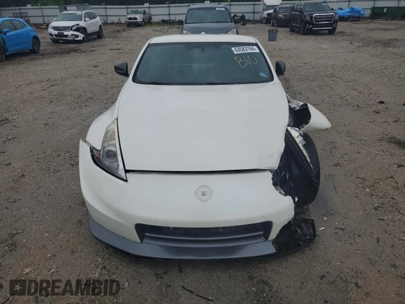 2014 Nissan 370Z with VIN JN1AZ4EH2EM633845, listed as a Copart auction lot 63583194 with 0 mi miles and Salvage Title. Bid and sale history available at carsss.com. Image 5.