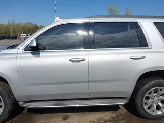 2015 GMC Yukon SLE with VIN 1GKS1AKC8FR540627, listed as a IAAI auction lot 42004023 with 128,195 mi miles. Bid and sale history available at carsss.com. Image 14.
