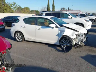 2014 Lexus CT 200h z VIN JTHKD5BH3E2177942, wystawiony jako IAAI lot #41751065 z przebiegiem 24 533 mil mil oraz . Historia ofert i sprzedaży dostępna na DreamBid. Obrazek 14.