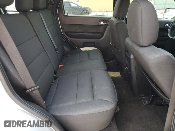 2011 Ford Escape XLT z VIN 1FMCU9DG8BKA85654, wystawiony jako Copart lot #64616925 z przebiegiem 188 948 mil mil oraz Szkoda całkowita • Salvage title. Historia ofert i sprzedaży dostępna na DreamBid. Obrazek 11.