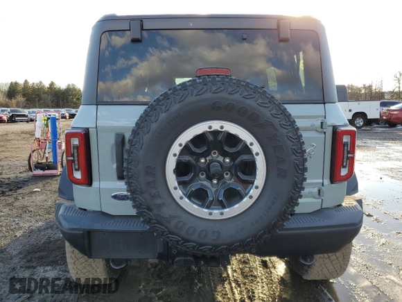 2023 Ford Bronco with VIN 1FMEE5DP8PLB93420, listed as a Copart auction lot 42247495 with 8,802 mi miles and Salvage Title. Bid and sale history available at DreamBid. Image 6.