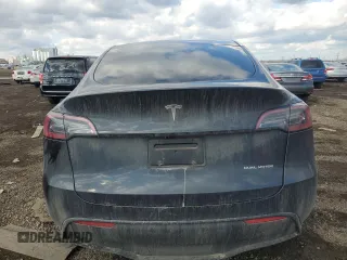 2024 Tesla Model Y Long Range with VIN 7SAYGDEE0RF985007, listed as a Copart auction lot 46619755 with Not Provided miles and Salvage Title. Bid and sale history available at DreamBid. Image 6.