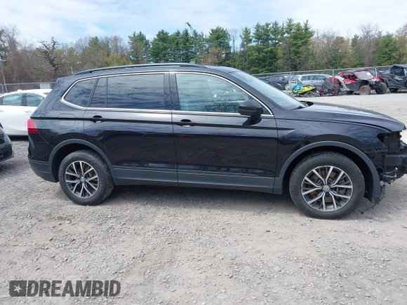 2019 Volkswagen Tiguan SE with VIN 3VV2B7AX7KM174382, listed as a IAAI auction lot 42147584 with 64,460 mi miles and . Bid and sale history available at DreamBid. Image 13.