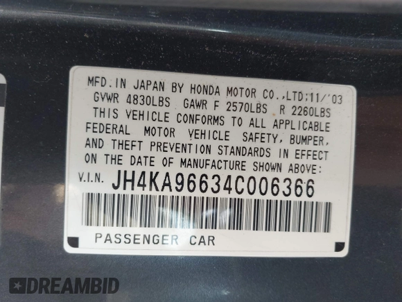 2004 Acura RL w/Navigation System with VIN JH4KA96634C006366, listed as a IAAI auction lot 42054689 with 350,809 mi miles. Bid and sale history available at carsss.com. Image 9.