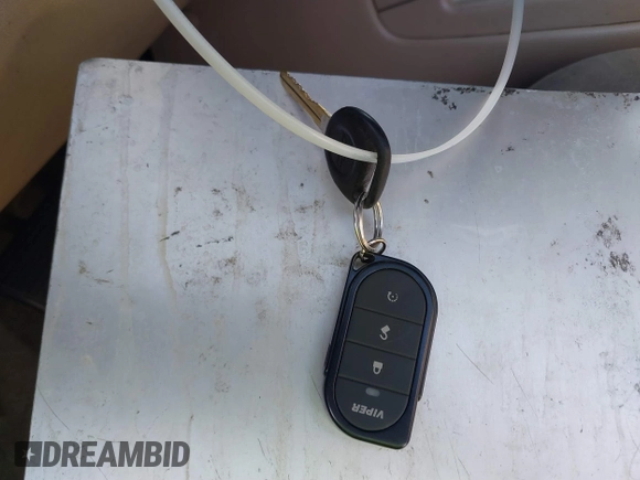 2003 Chevrolet Tahoe LT with VIN 1GNEC13Z33R261062, listed as a IAAI auction lot 41882613 with Not provided miles and . Bid and sale history available at DreamBid. Image 11.