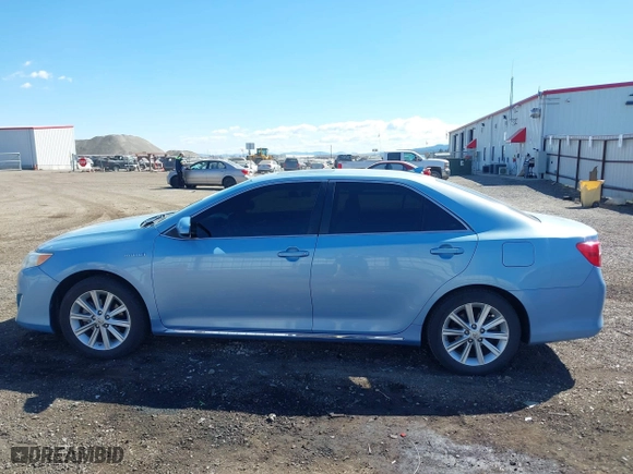 2014 Toyota Camry Hybrid LE with VIN 4T1BD1FK7EU098824, listed as a IAAI auction lot 42063119 with 112,759 mi miles. Bid and sale history available at carsss.com. Image 14.