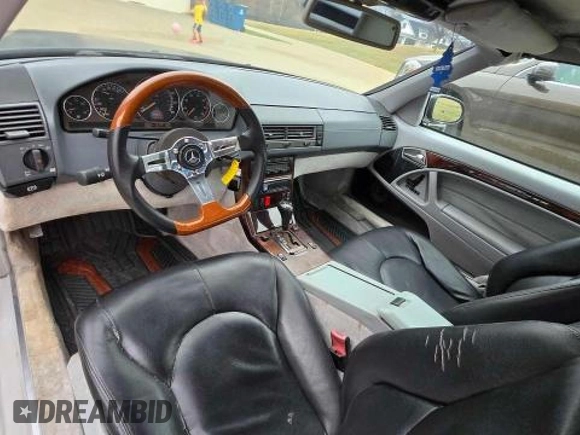 1999 Mercedes-Benz SL 500 with VIN WDBFA68FXXF184548, listed as a Copart auction lot 48104955 with 133,450 mi miles and Clean title. Bid and sale history available at DreamBid. Image 9.