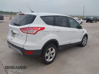 2016 Ford Escape SE z VIN 1FMCU0G79GUC41641, wystawiony jako IAAI lot #42103256 z przebiegiem 153 792 mil mil oraz . Historia ofert i sprzedaży dostępna na DreamBid. Obrazek 4.