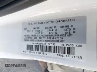2014 Mazda 3 i Grand Touring with VIN JM1BM1M7XE1102093, listed as a IAAI auction lot 41344433 with 148,395 mi miles and . Bid and sale history available at DreamBid. Image 9.