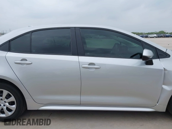 2023 Toyota Corolla LE z VIN 5YFB4MDE5PP077487, wystawiony jako IAAI lot #41787681 z przebiegiem 19 831 mil mil oraz . Historia ofert i sprzedaży dostępna na DreamBid. Obrazek 13.