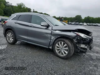 2019 Infiniti QX50 Essential with VIN 3PCAJ5M37KF107957, listed as a Copart auction lot 58545645 with 130,535 mi miles and Salvage title. Bid and sale history available at DreamBid. Image 4.
