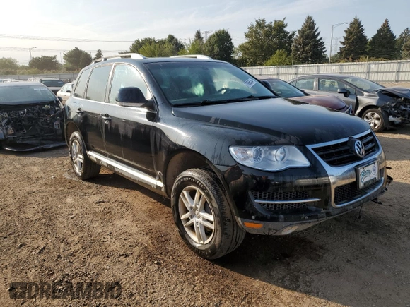 2010 Volkswagen Touareg VR6 with VIN WVGBF7A9XAD001790, listed as a Copart auction lot 70806534 with 90,103 mi miles and Salvage Title. Bid and sale history available at DreamBid. Image 4.